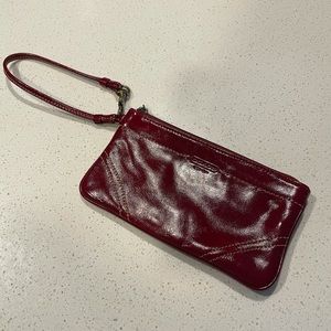 Coach dark red wristlet